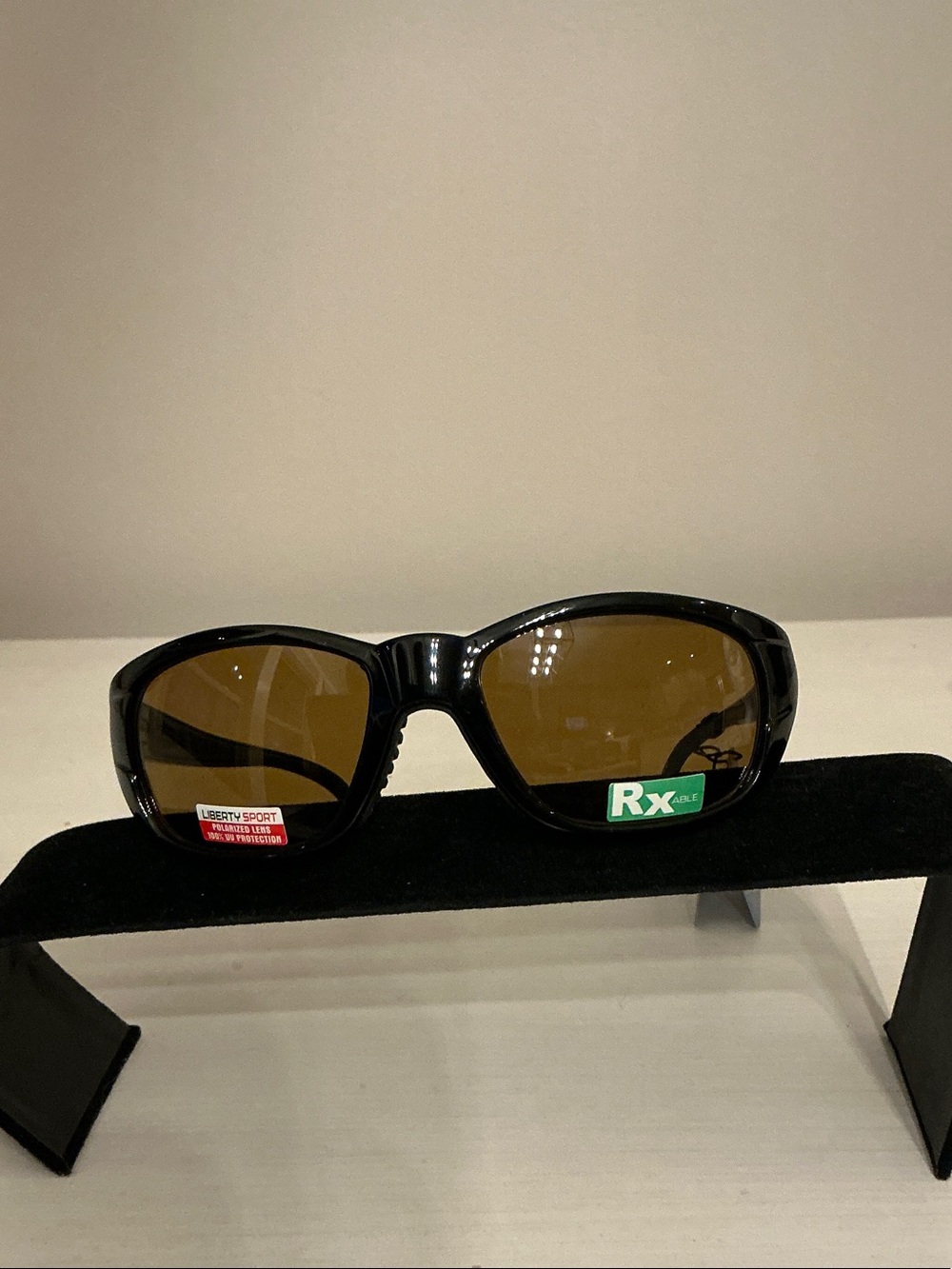 Liberty Sport, Reef Men's Black Frame Sunglasses with Brown Lenses